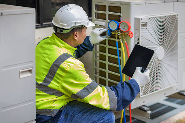 Professional Ac Installation technician working in Versailles, NY